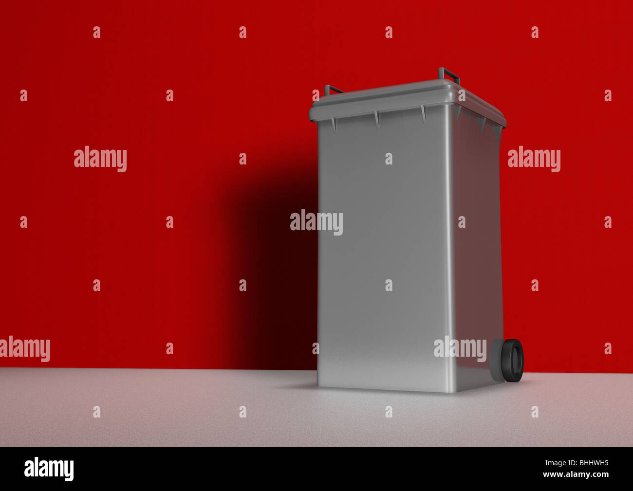 Grey or Black Garbage Can or Dustbin with closed Lid Stock Photo