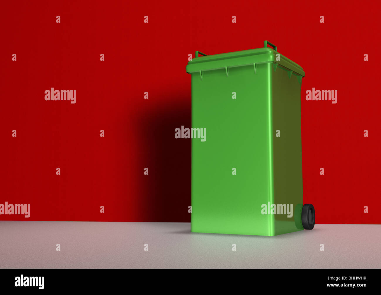 Green Garbage Can or Dustbin with closed Lid Stock Photo