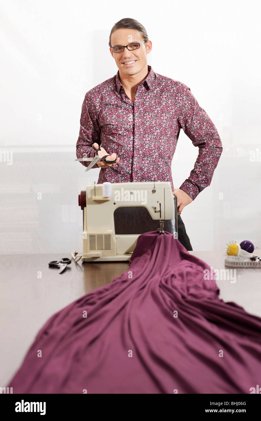 tailor enjoying his job Stock Photo - Alamy