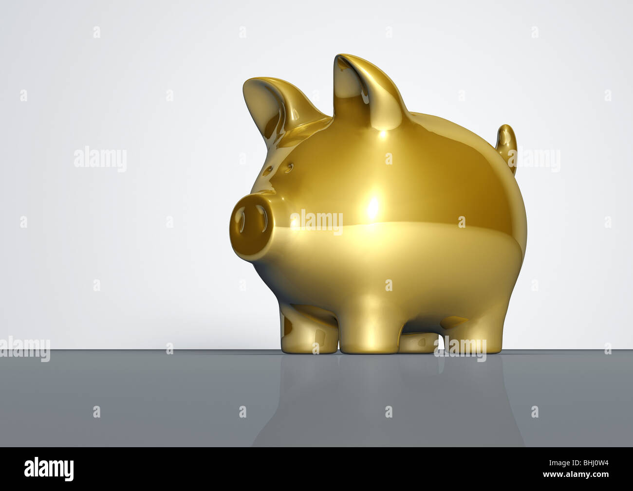 Golden Piggy bank - Goldenes Sparschwein Stock Photo