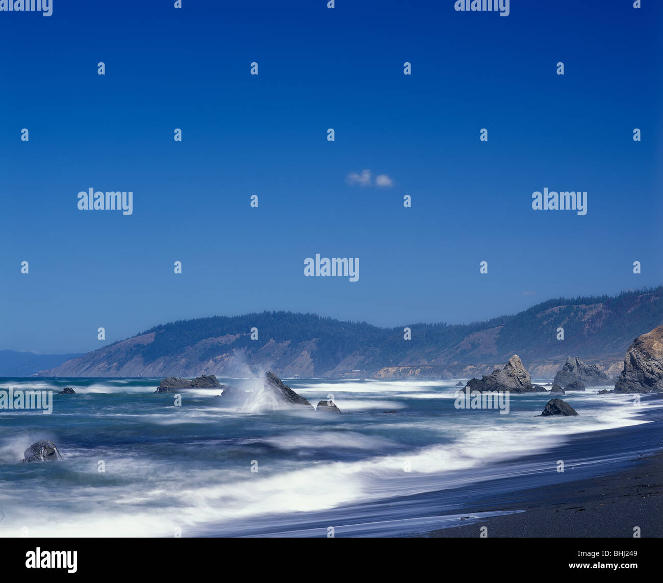 Waves crash against the rocks in Mendocino County, California Stock Photo