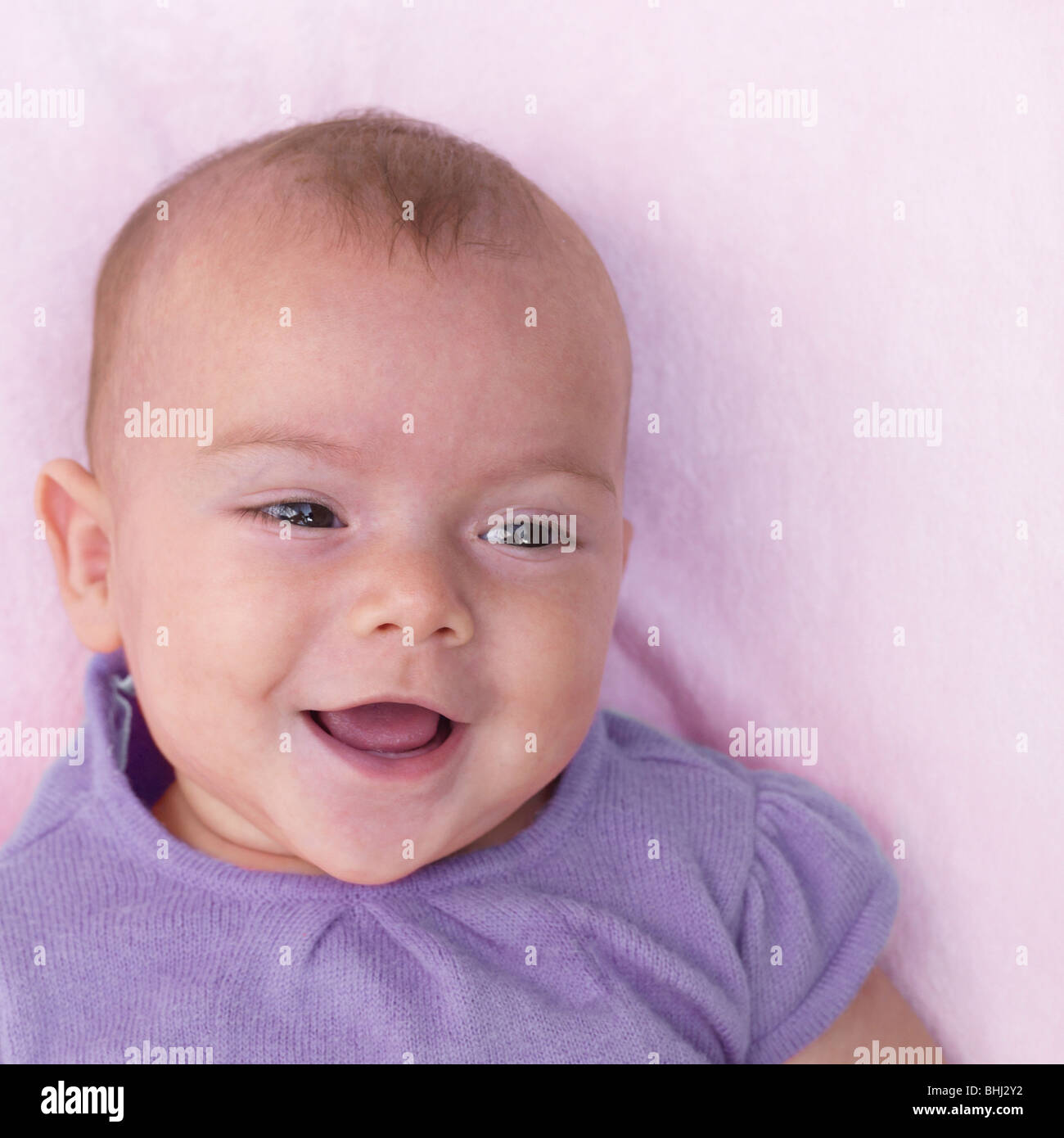 Portrait of baby girl, smiling Stock Photo Alamy