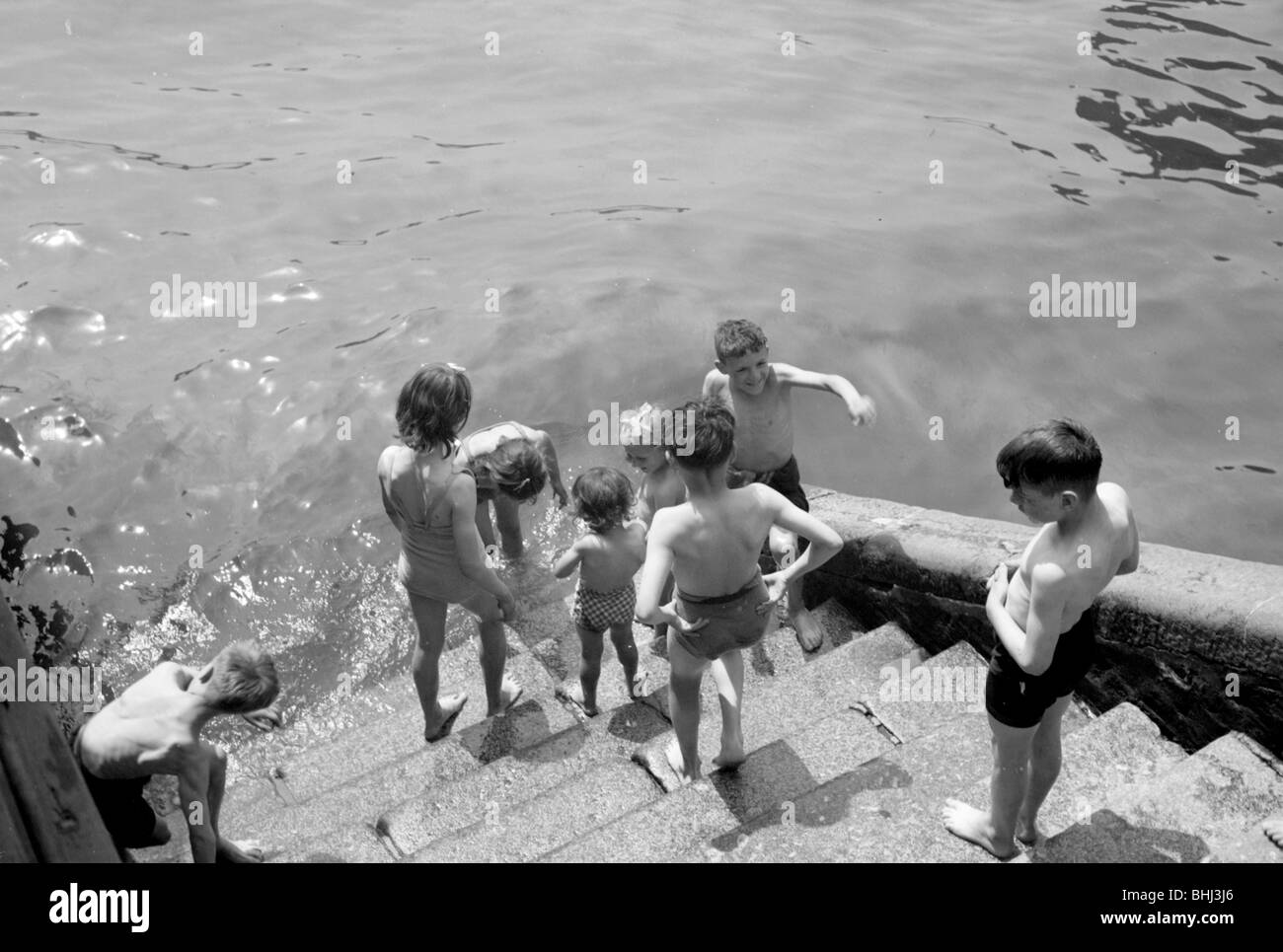 Children bathing in the River Thames, Tower Pier approach, Stepney