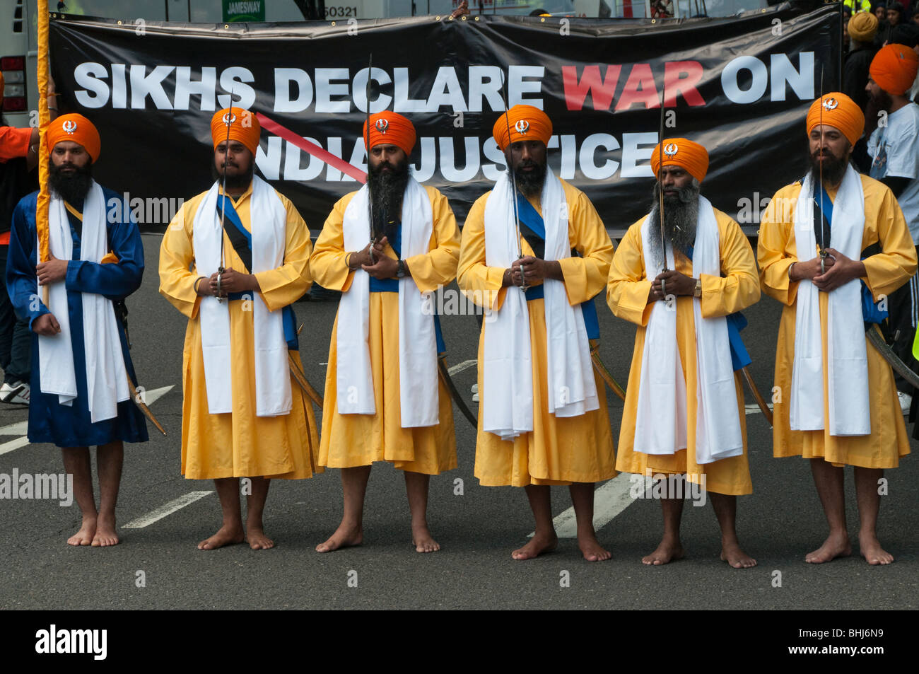 Sikhs mark the 25th anniversary of Amritsar massacres by Indian army and call for an Sikh state. Panj Piyare at head of march Stock Photo