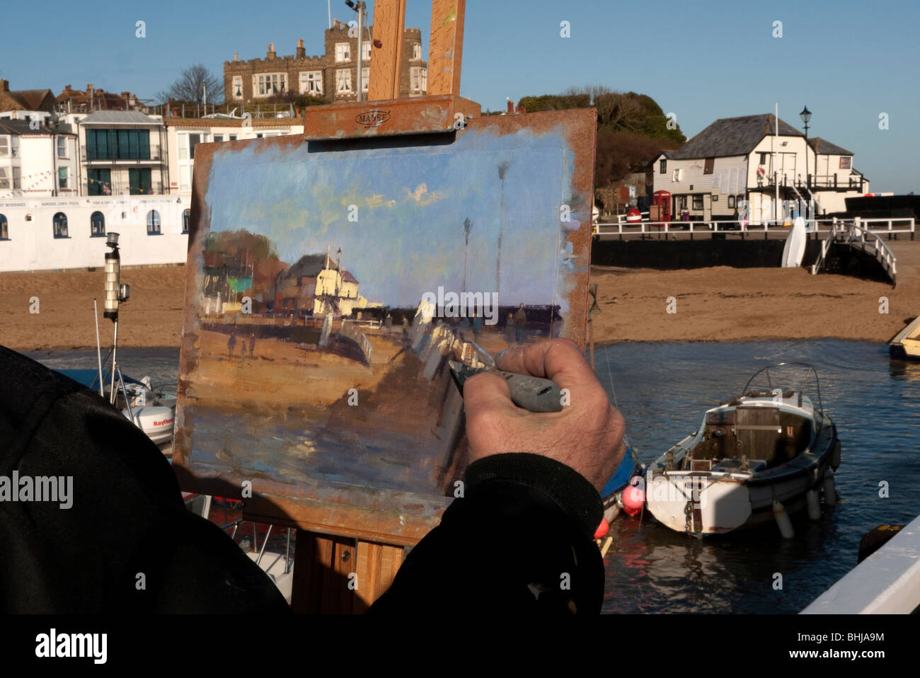 Artist working at Viking Bay Broadstairs Kent. Stock Photo