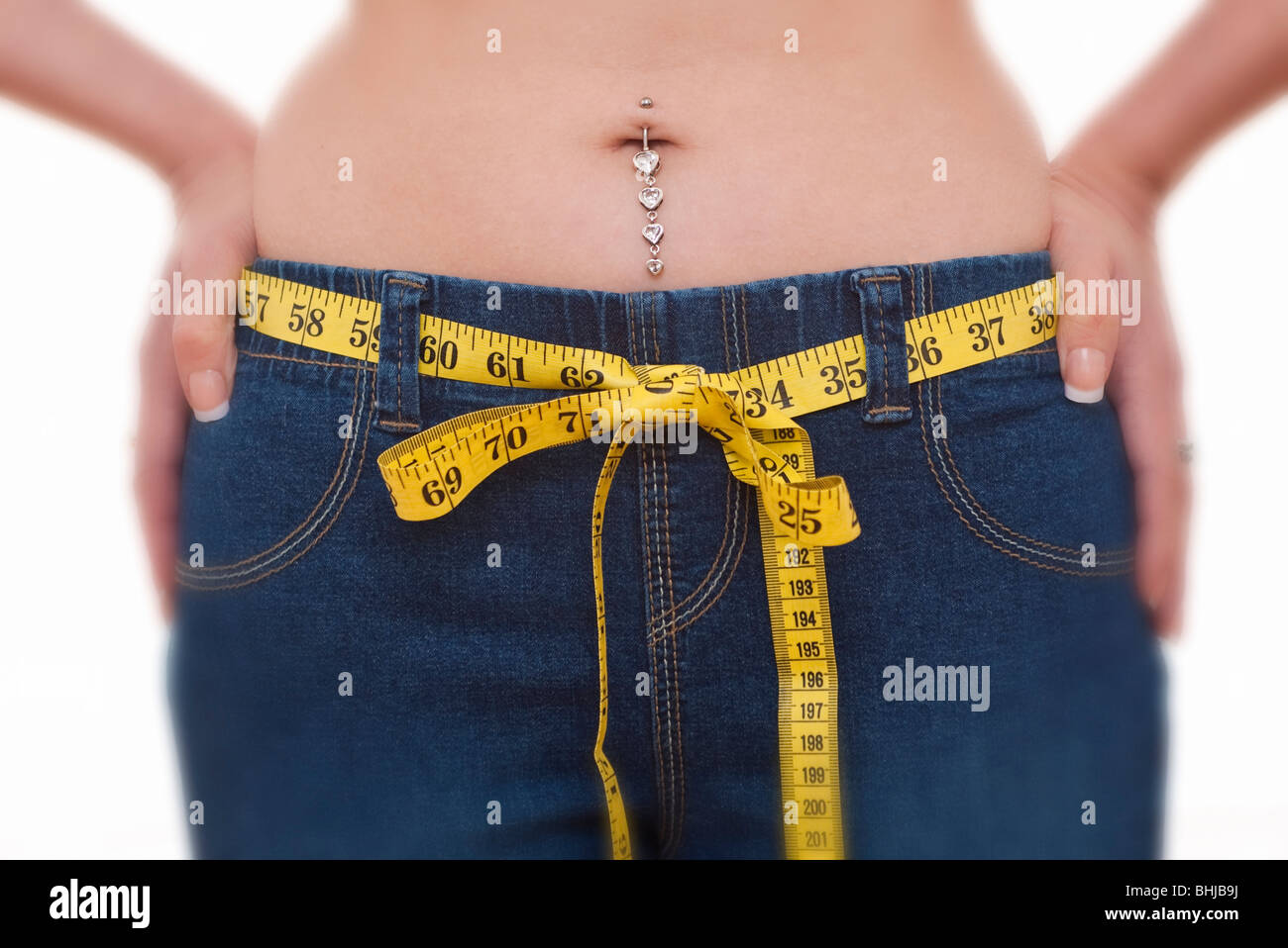 Woman Tighten Belt High Resolution Stock Photography and Images Alamy