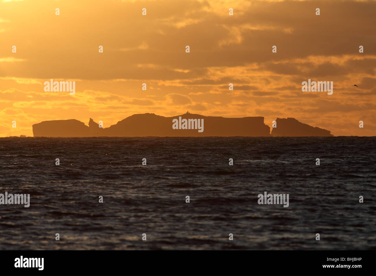Sunset over the Holm of West Sandwick, Yell, Shetland Islands Stock Photo