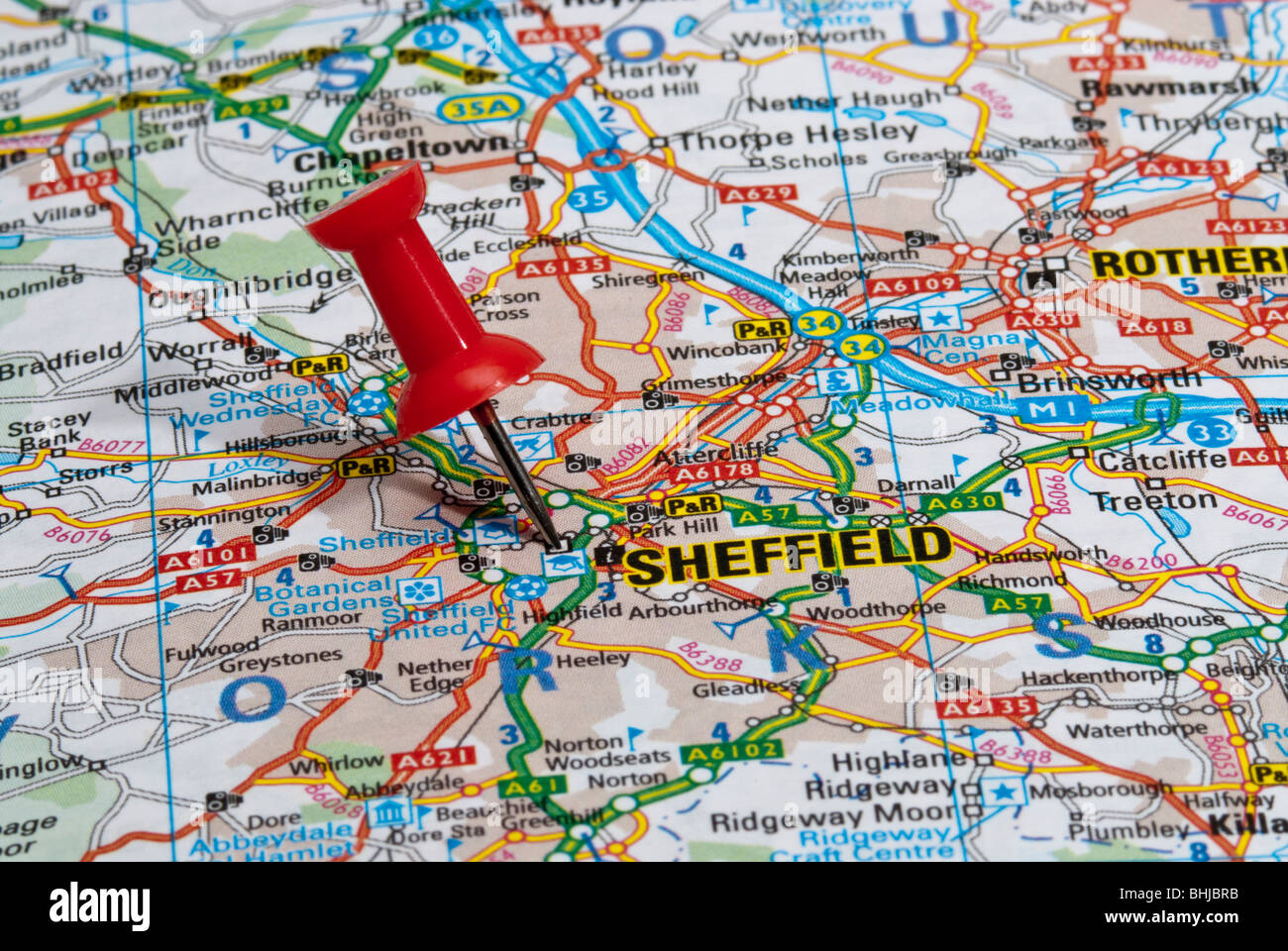 red map pin in road map pointing to city of Sheffield Stock Photo
