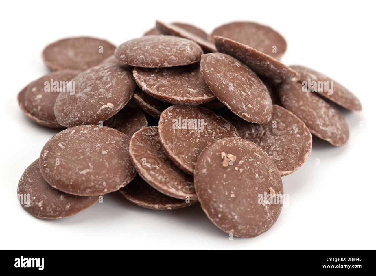 Pile of Cadburys milk chocolate buttons Stock Photo