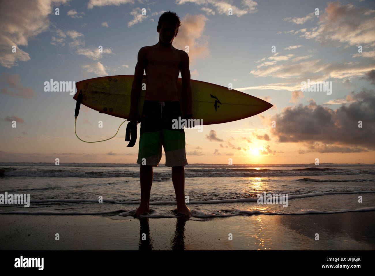 Surfer on Playa Hermosa in Costa Rica, Central America Stock Photo