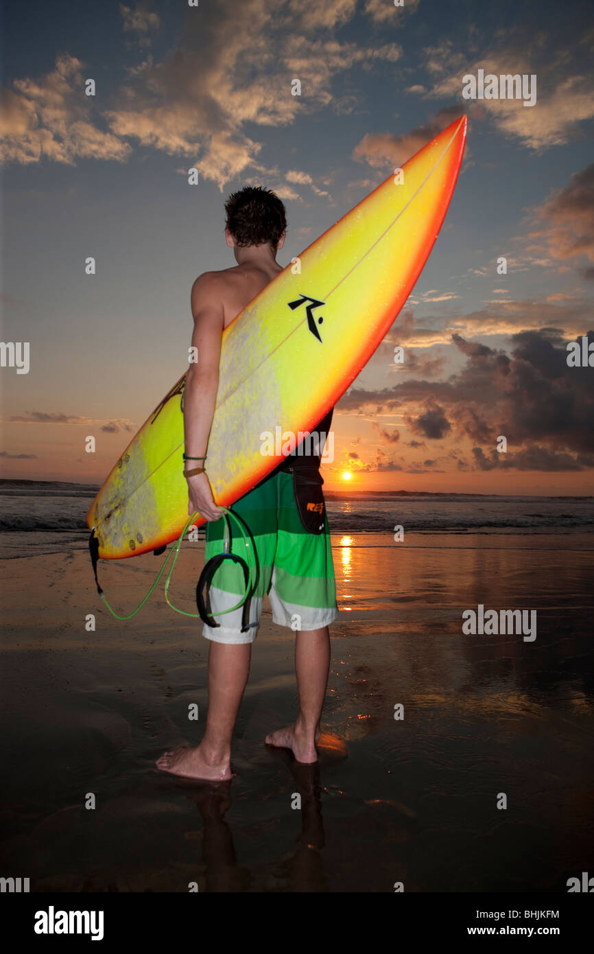 Surfer on Playa Hermosa in Costa Rica, Central America Stock Photo