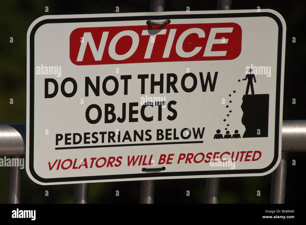 NOTICE Do not throw objects, pedestrians below, Violator will be prosecuted sign in Niagara