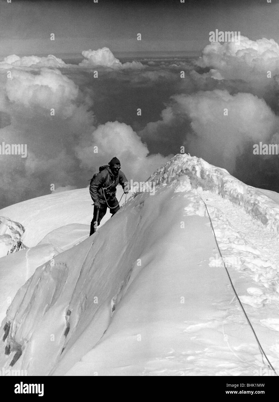 Alpinist man top mountain Black and White Stock Photos & Images - Alamy