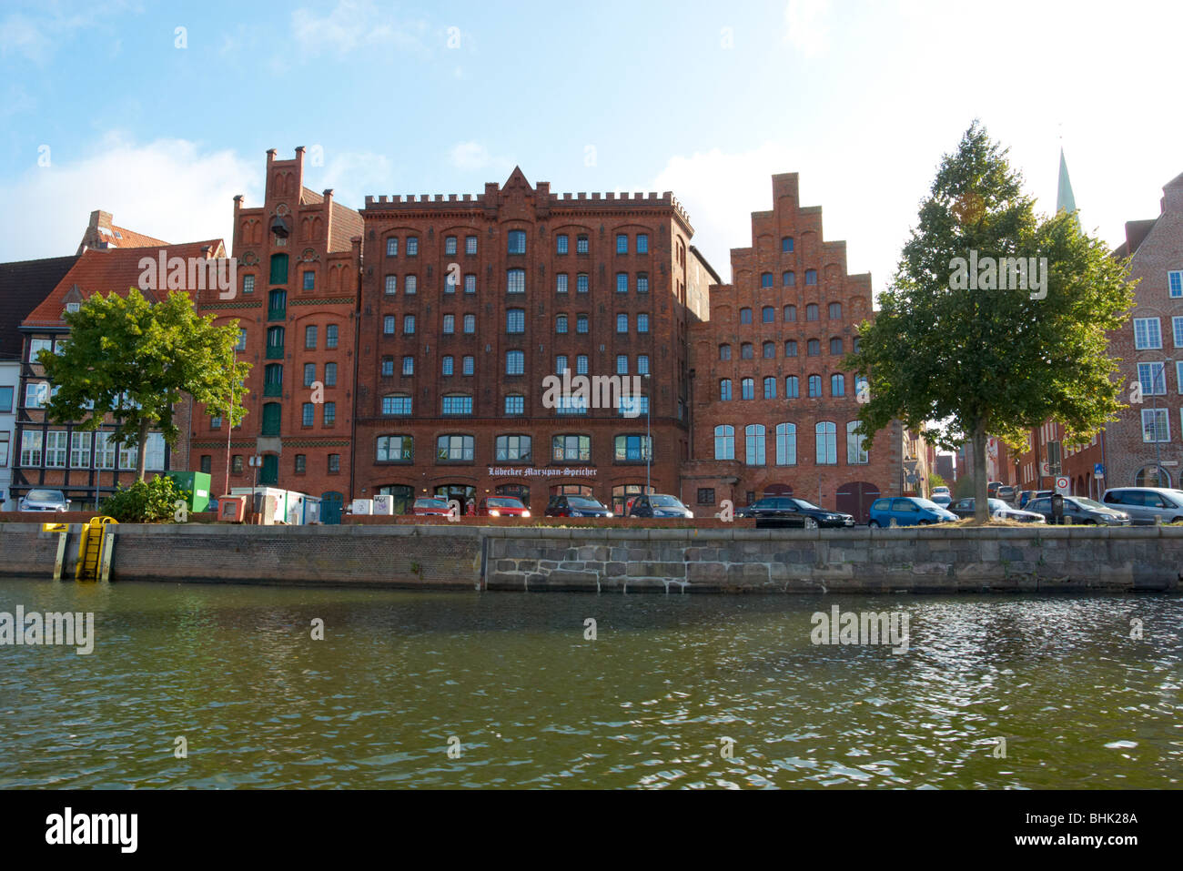View of the old town Lubeck from the river or canal sourrounding the city. Stock Photo