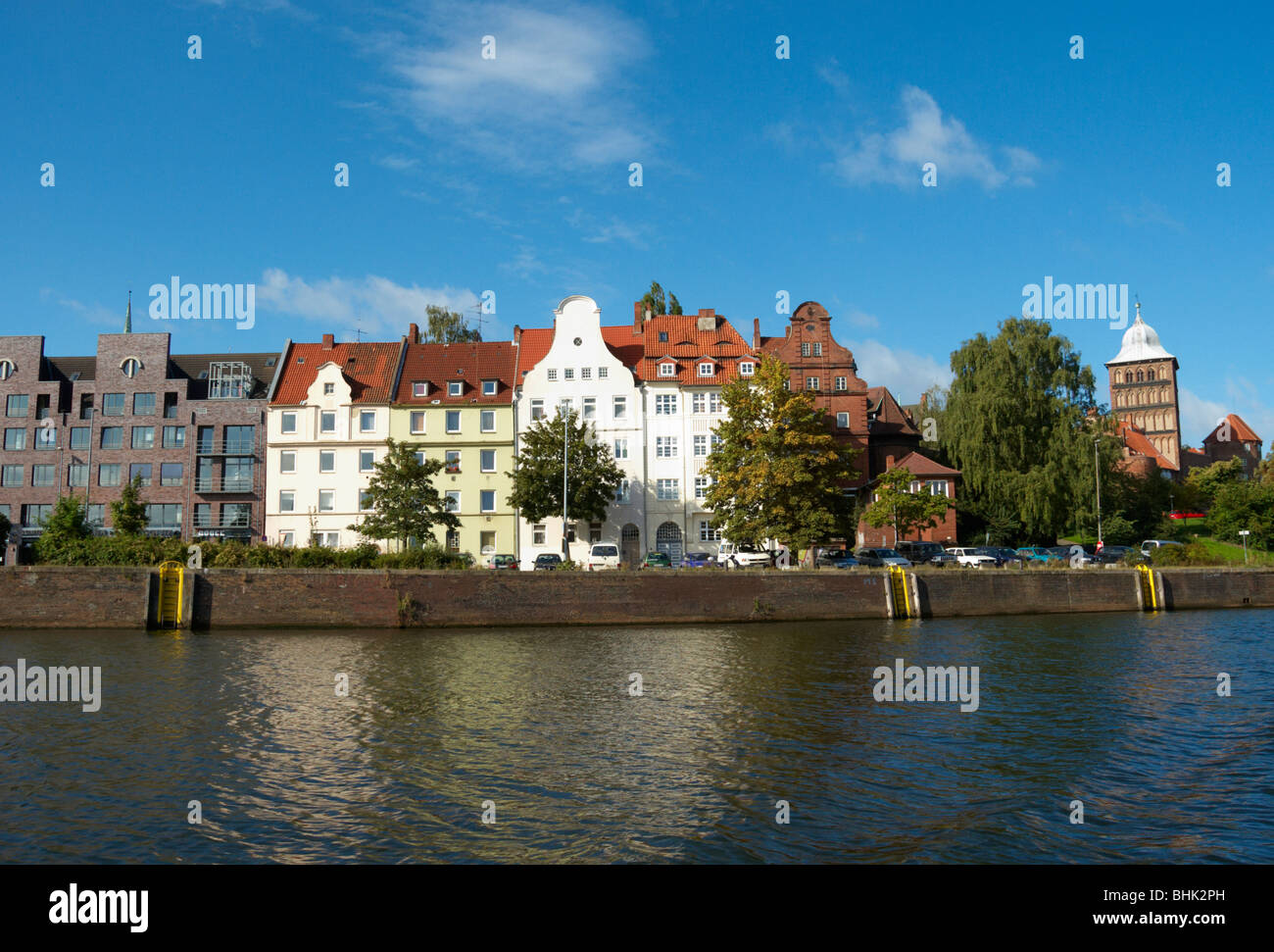 View of the old town Lubeck from the river or canal sourrounding the city. Stock Photo