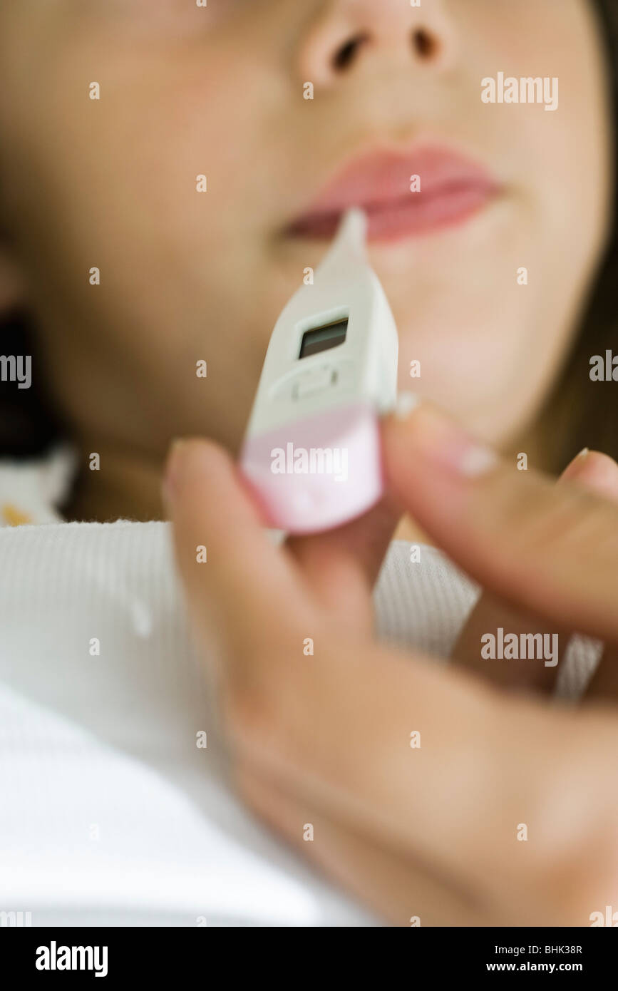 Taking child's temperature Stock Photo Alamy
