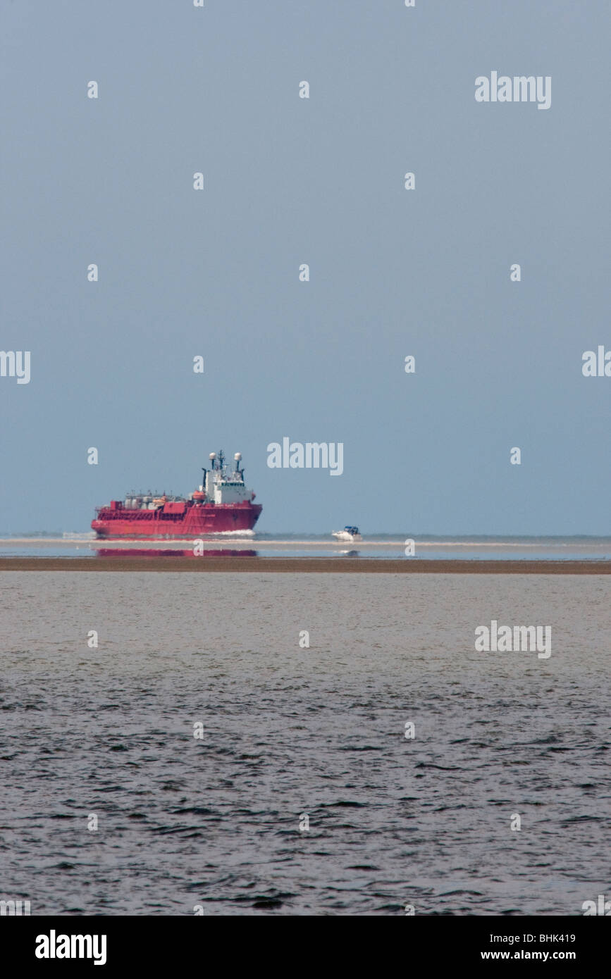 A offshore vessel approaching Esbjerg. Stock Photo