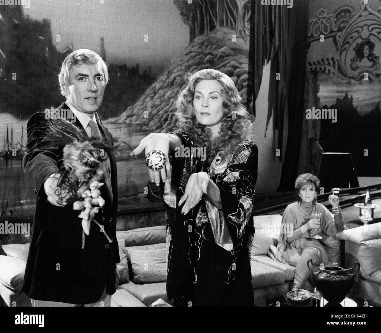 Peter Cook (1933-94) and Faye Dunaway (1941- ), 1984. Artist: Unknown Stock Photo
