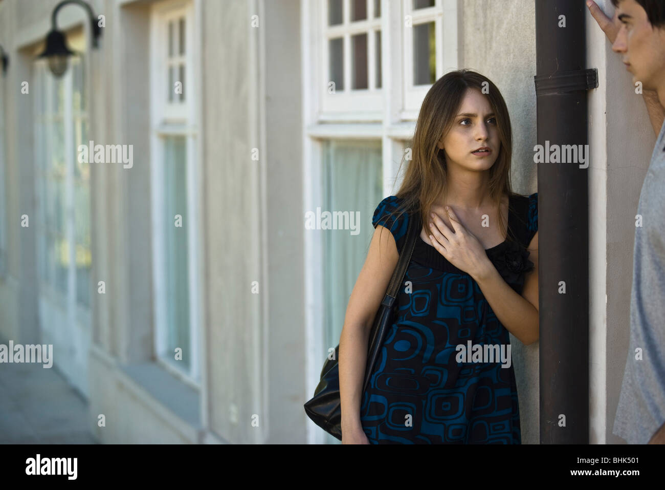 Young woman in serious conversation with boyfriend Stock Photo