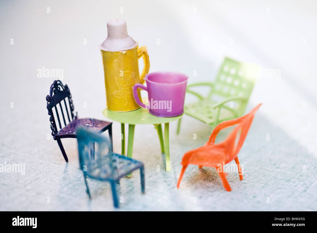 Toy patio furniture and thermos Stock Photo Alamy