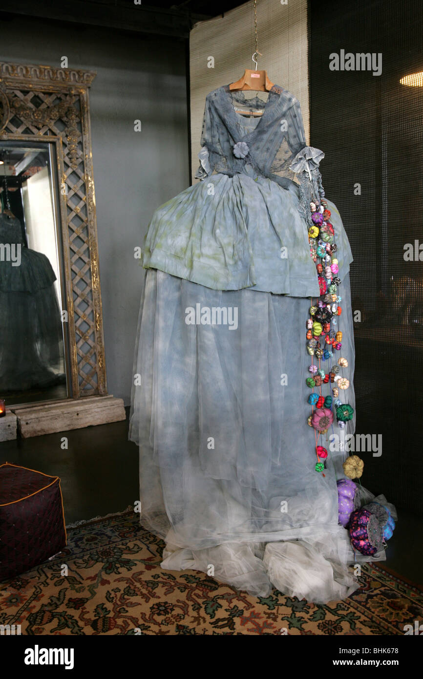 Wedding dress hanging Stock Photo - Alamy