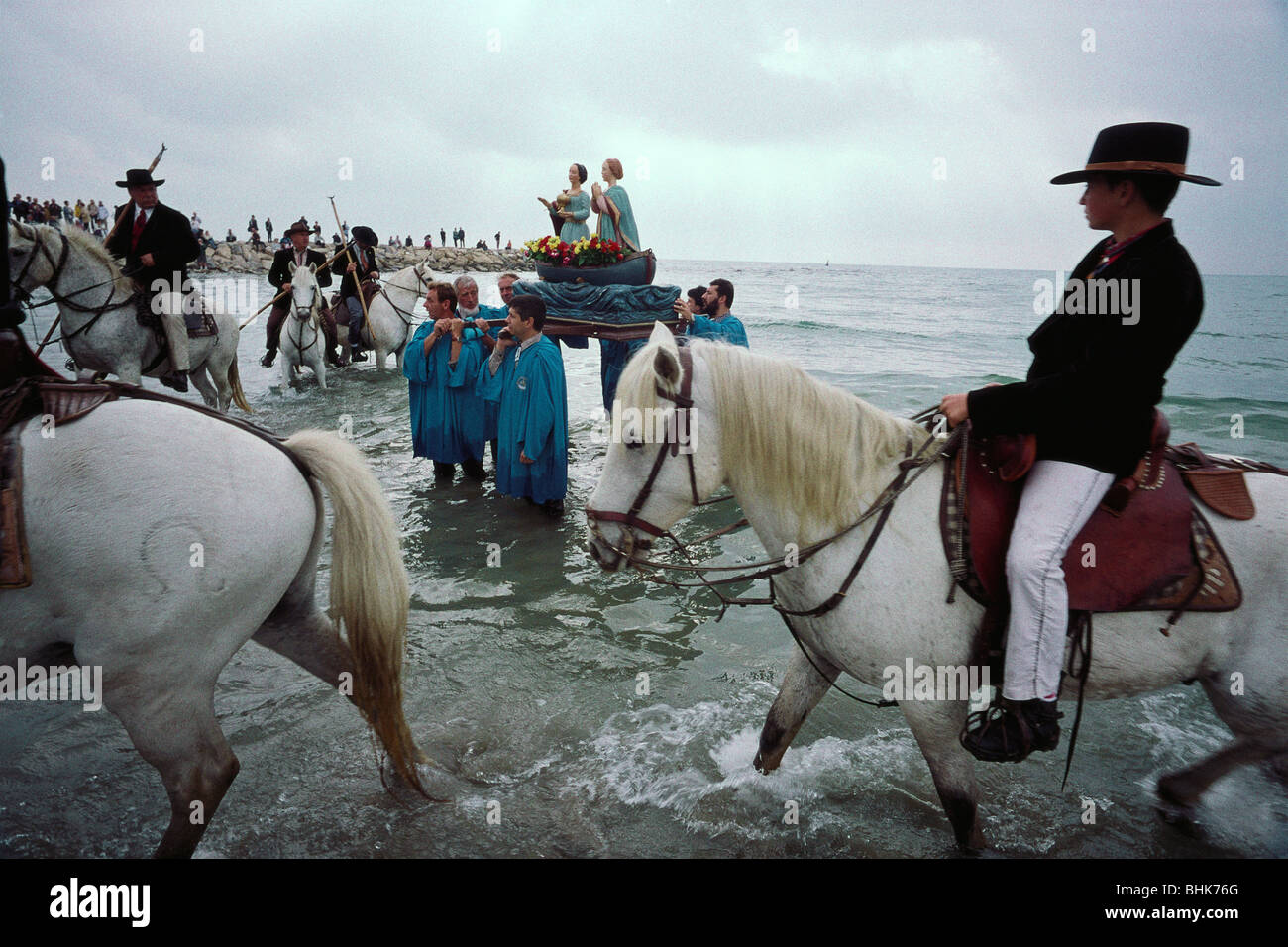 Saintes Maries de la Mer. Camargue. France. Local cowboys or Gardians lead the procession of the annual Gypsy Pilgrimage. Stock Photo