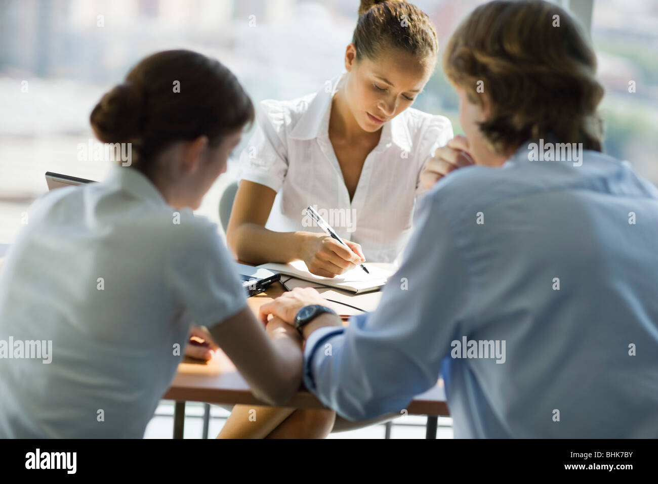 Couple meeting with advisor Stock Photo