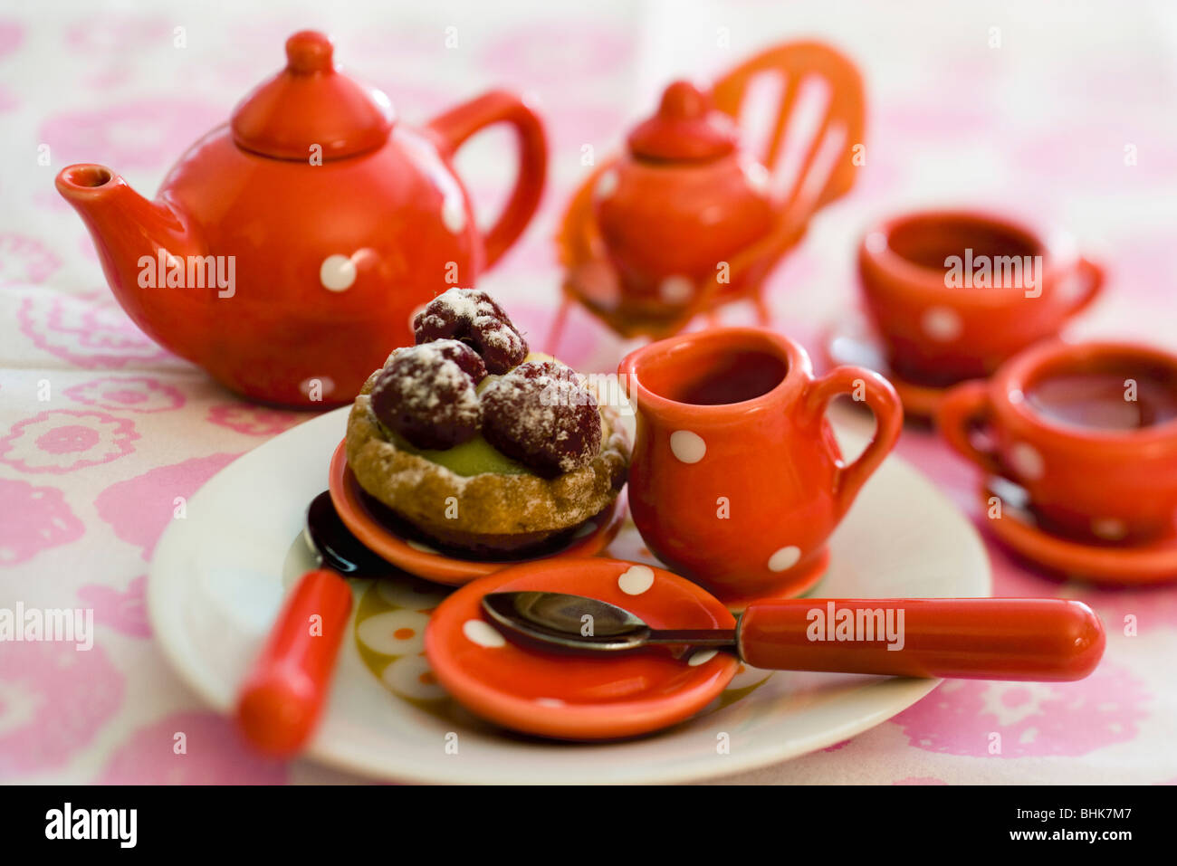 Toy tea set with pastry Stock Photo Alamy