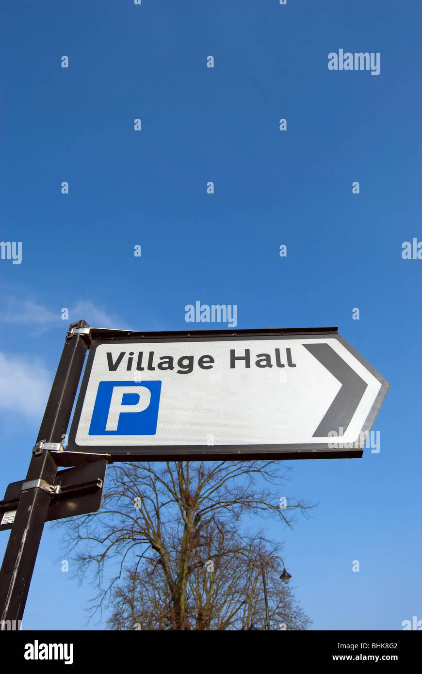 parking and village hall sign in shepperton, middlesex, england Stock Photo