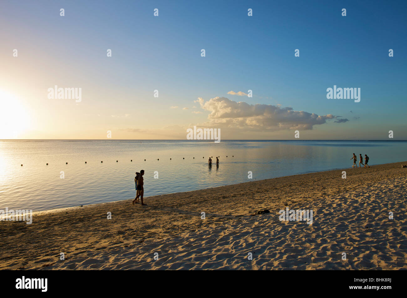 Sunset beach walk on the island of Mauritius in the Indian Ocean Stock Photo