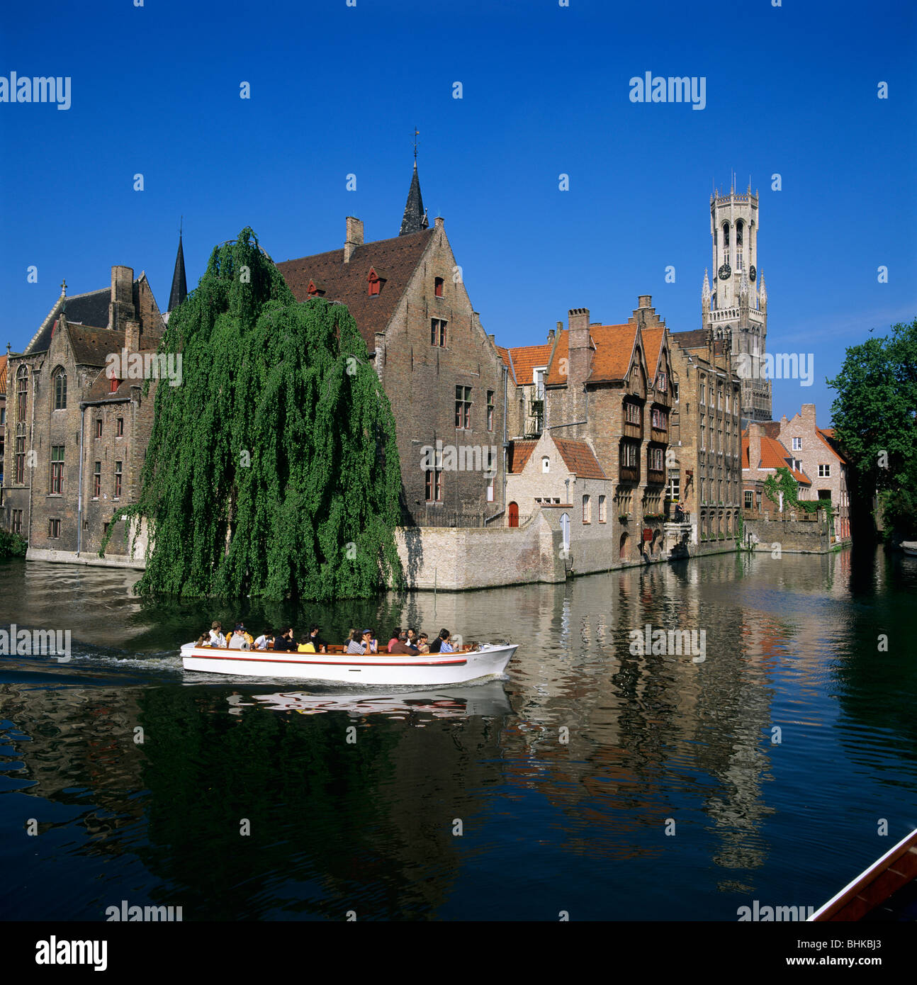 Rozenhoedkaai and the Belfry with tour boat Stock Photo