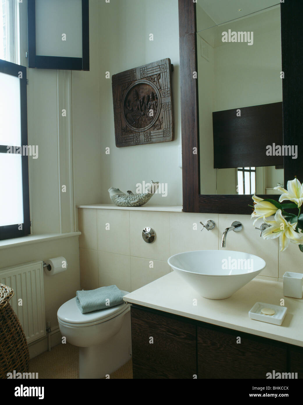 Basins and toilet in modern white bathroom Stock Photo Alamy