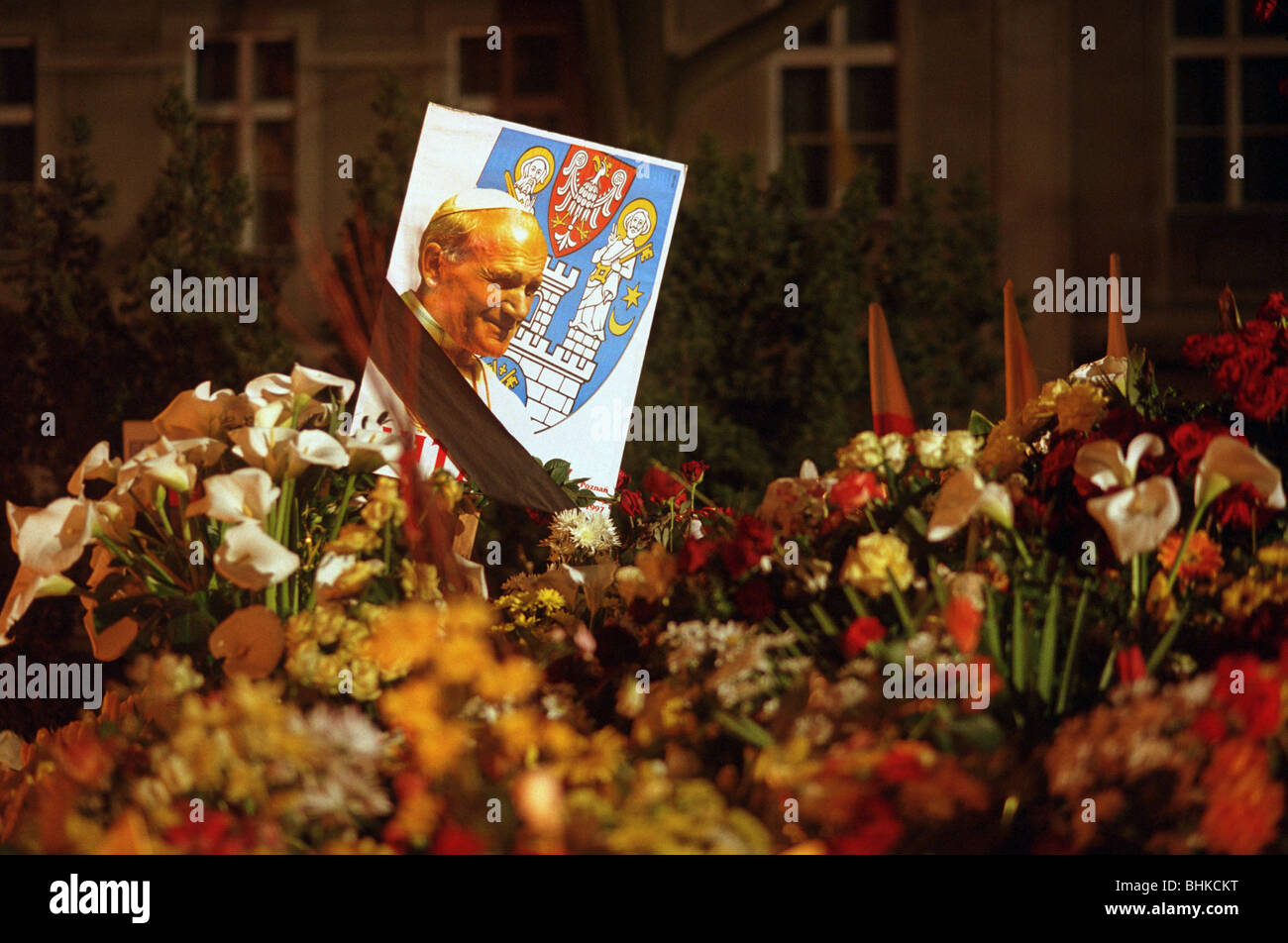 Flowers and a picture of Pope John Paul II with a black ribbon, Poznan, Poland Stock Photo