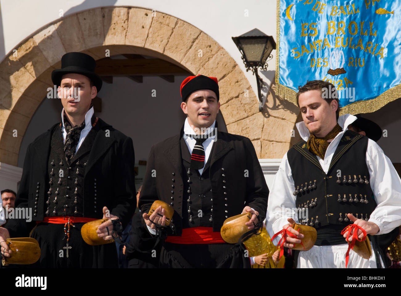 Young men in ibiza traditional costume playing castanets, Ibiza, Spain Stock Photo