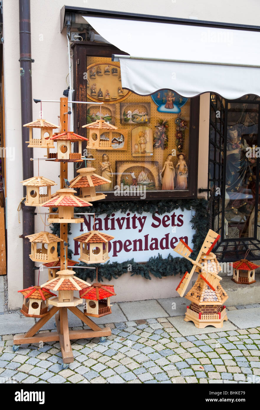 Bird boxes outside a Bavarian woodcarving shop Oberammergau Bavaria Germany Europe Stock Photo