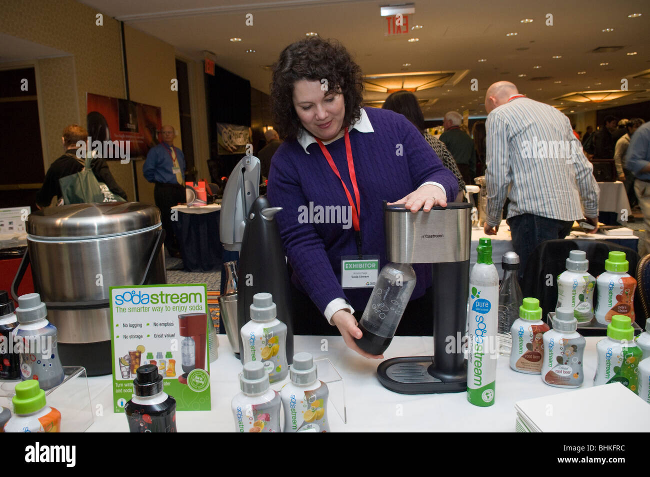 A representative from SodaStream demonstrates their home soda maker at the 2010 Green Products Expo in New York Stock Photo