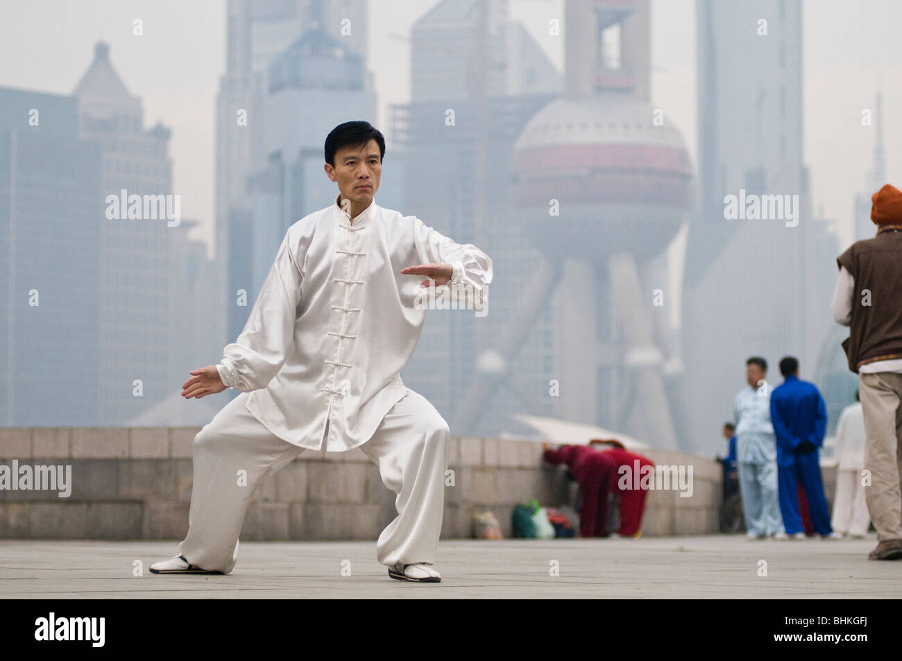 People exercising along the Huang Pu River waterfront in Shanghai ...