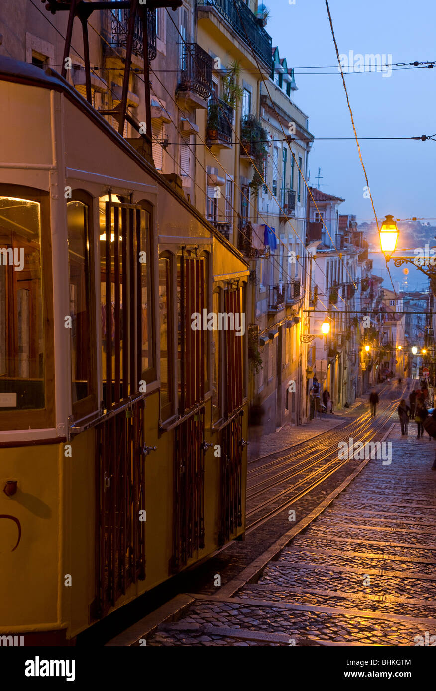 Portugal Lisbon Funicular tram illuminated at twilight in the Catarina District Stock Photo