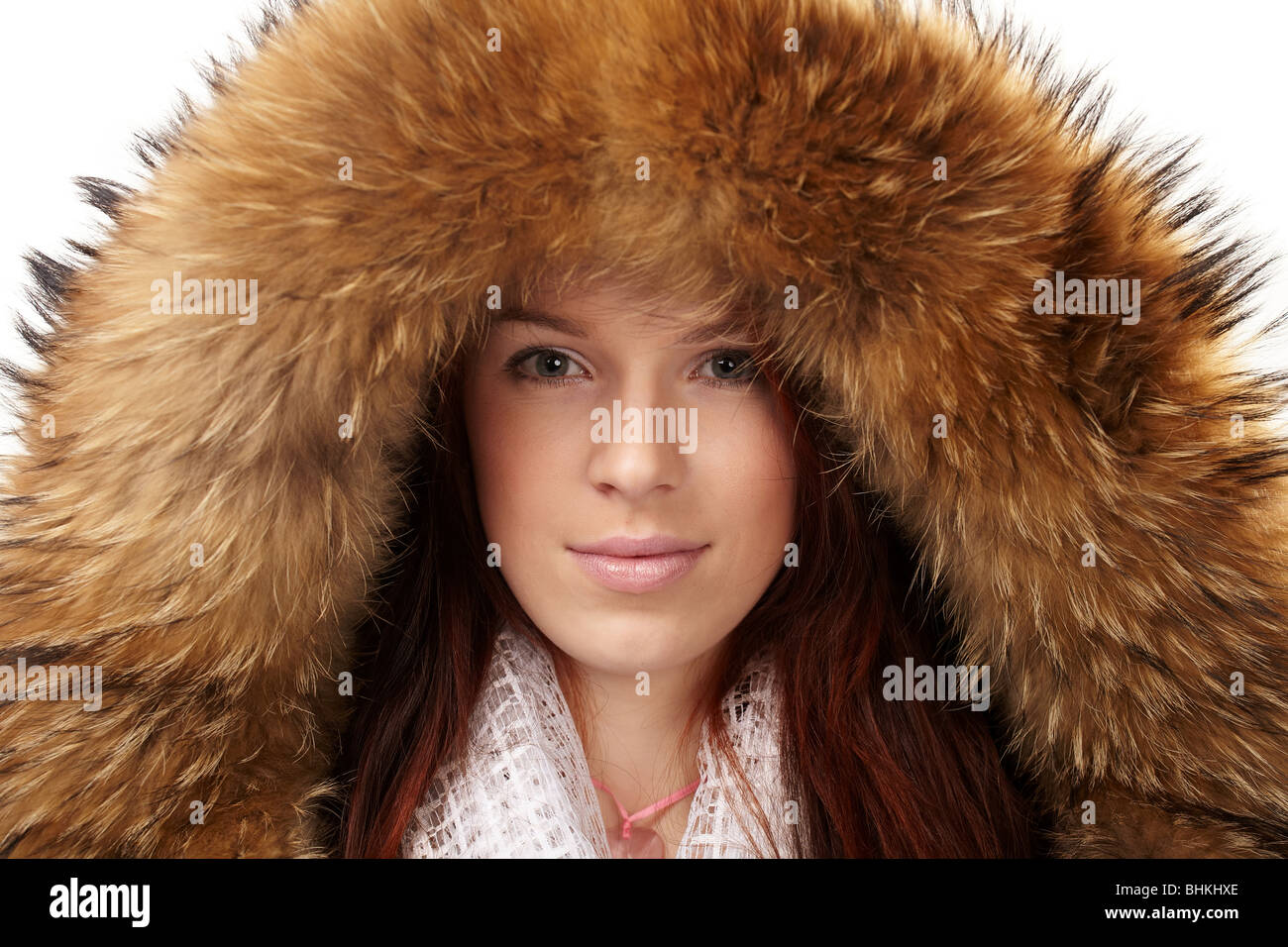 Beautiful woman in winter fur coat Stock Photo