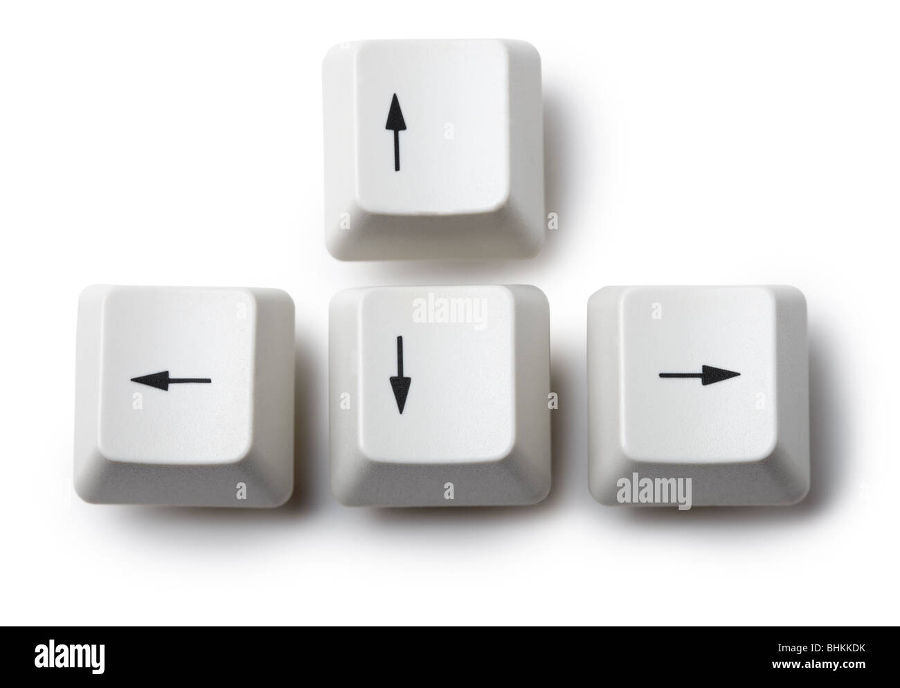 The four keyboard arrow keys on a white background Stock Photo