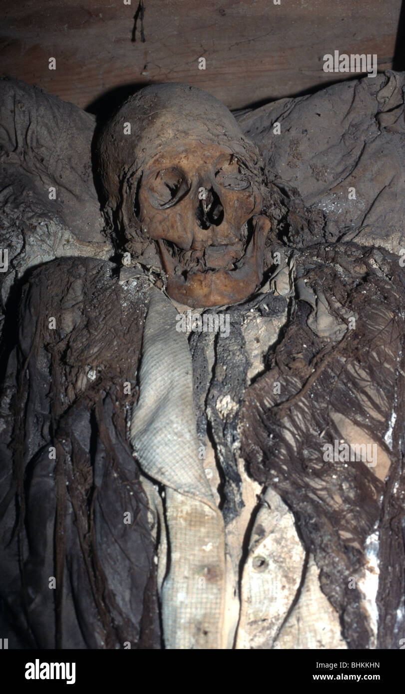 Clothed corpse in a coffin in the catacombs in the Templo del Carmen, Mexico City, Mexico. Stock Photo