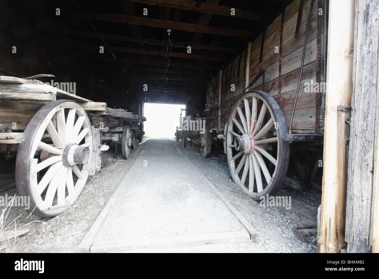High-Sided Freight Wagons in a Barn, Bodie State Historic Park, California Stock Photo