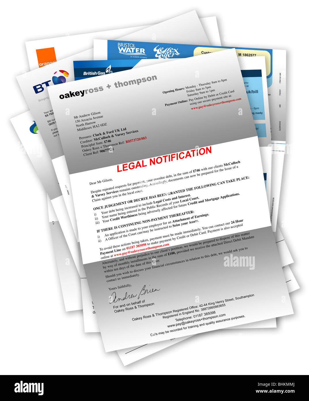 Legal Notification Letter due to unpaid/bad debt and household bills beneath Stock Photo