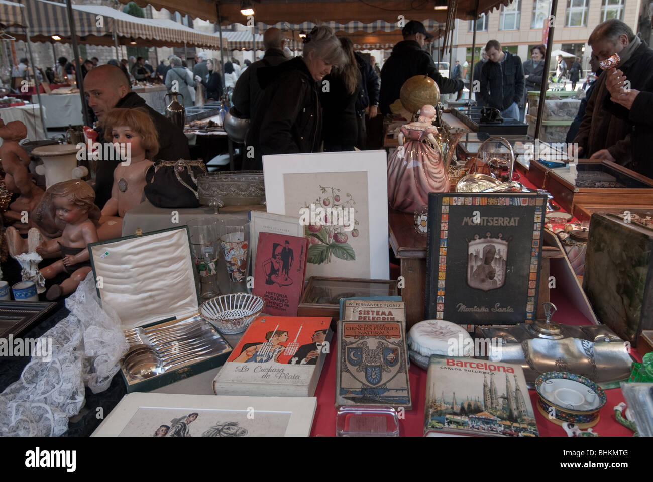Bric a brac and antiques for sale at a fle market in barcelona. Stock Photo