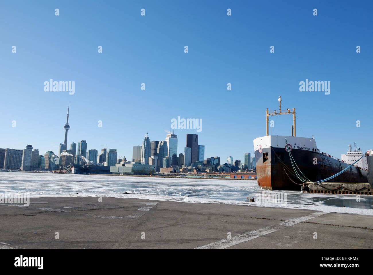 A view of a great lakes freighter moored for the winter in Toronto harbour's shipping port Stock Photo