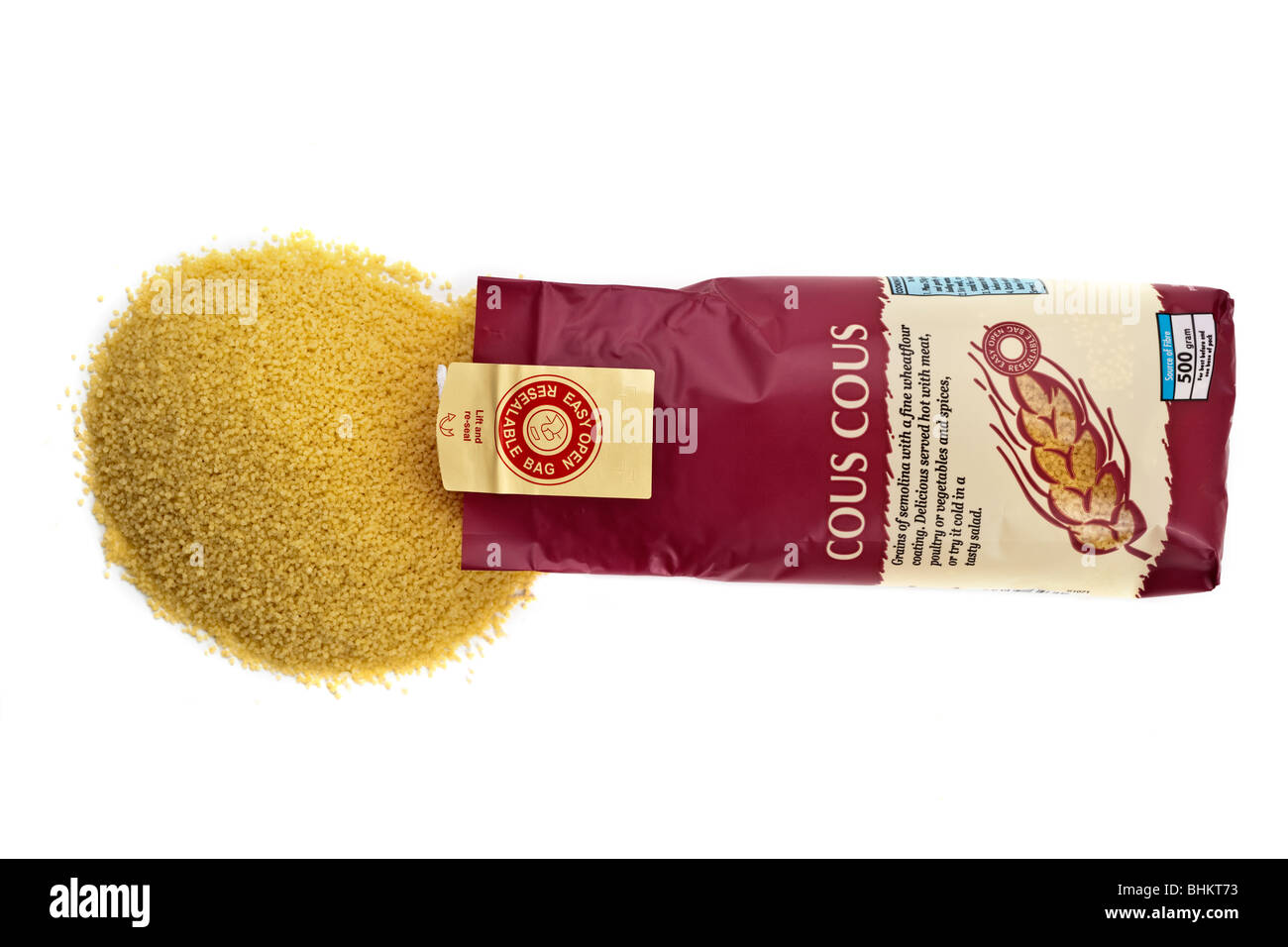 500 gram bag of Couscous spilling onto a white surface Stock Photo