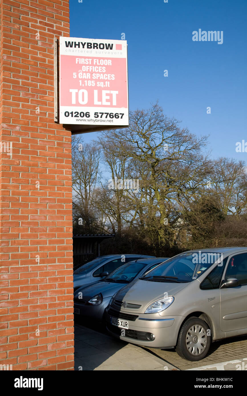 Offices to let with parking spaces sign Stock Photo