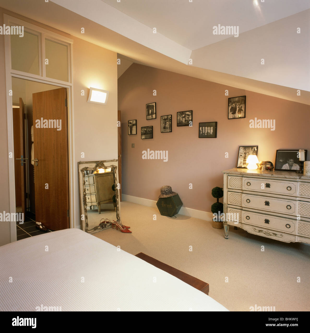 Cream Carpet In Beige Townhouse Bedroom With Cream Painted Stock