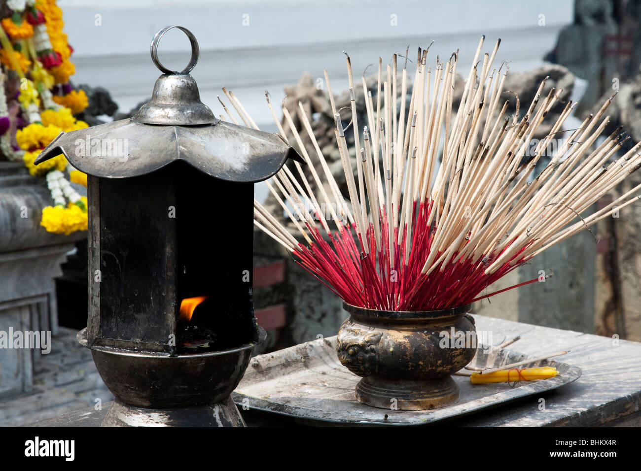 Incense burning on a alter in Wat Arum Bangkok Thailand Stock Photo - Alamy