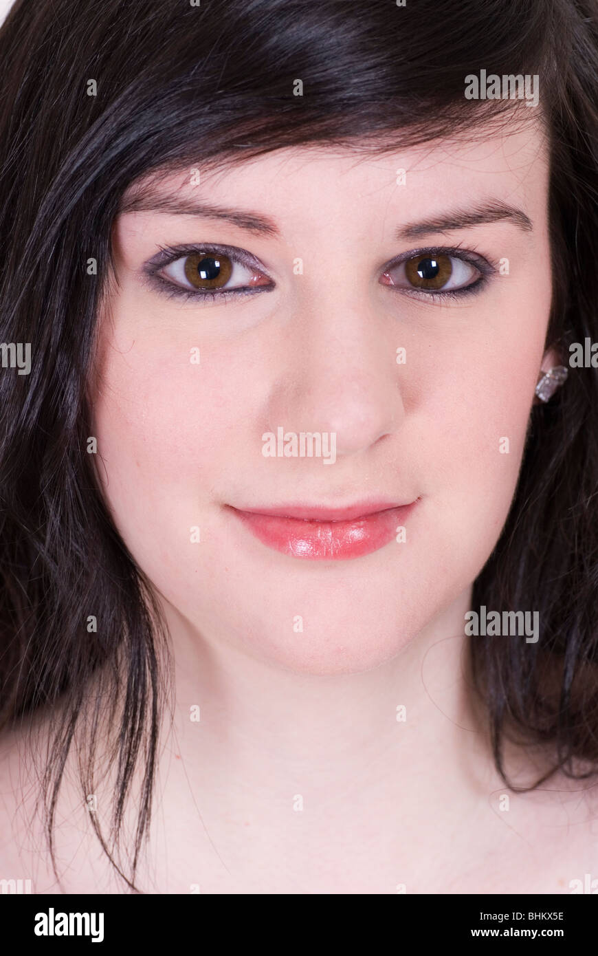 Beautiful young woman looking at the camera smiling Stock Photo - Alamy